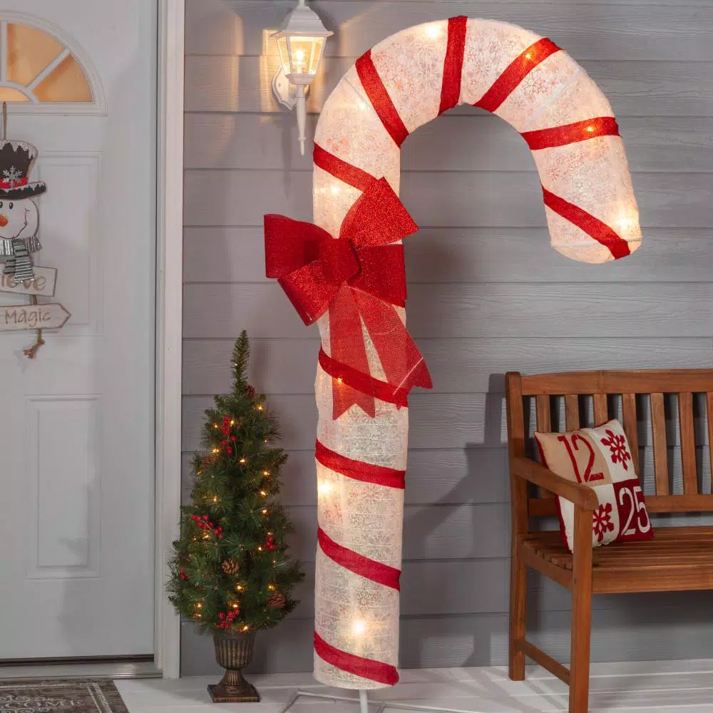 Unbranded 72 in. Lighted Candy Cane Outdoor Holiday Decoration with Red Bow and Snowflake Accents
