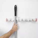 OXO Good Grips Expandable Wall-Mounted Organizer and Broom Mop Holder thumbnail 2
