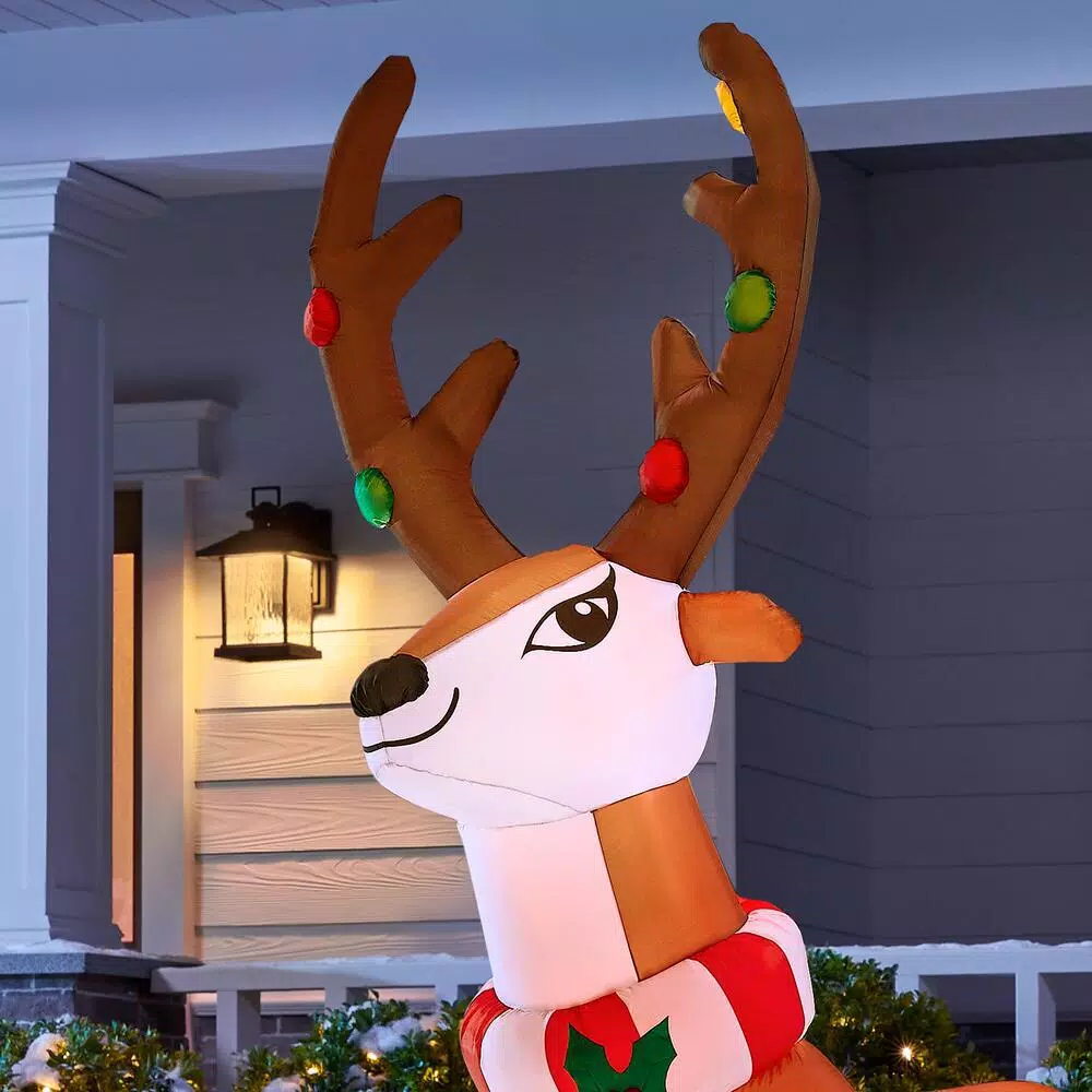 Home Accents Holiday 6 ft. Airblown Inflatable Reindeer with LED Lights and Striped Scarf