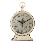 Stonebriar Collection Faith Round Tabletop Clock - 12.5 in. Rustic Ivory Metal Analog Clock with Cross thumbnail 1