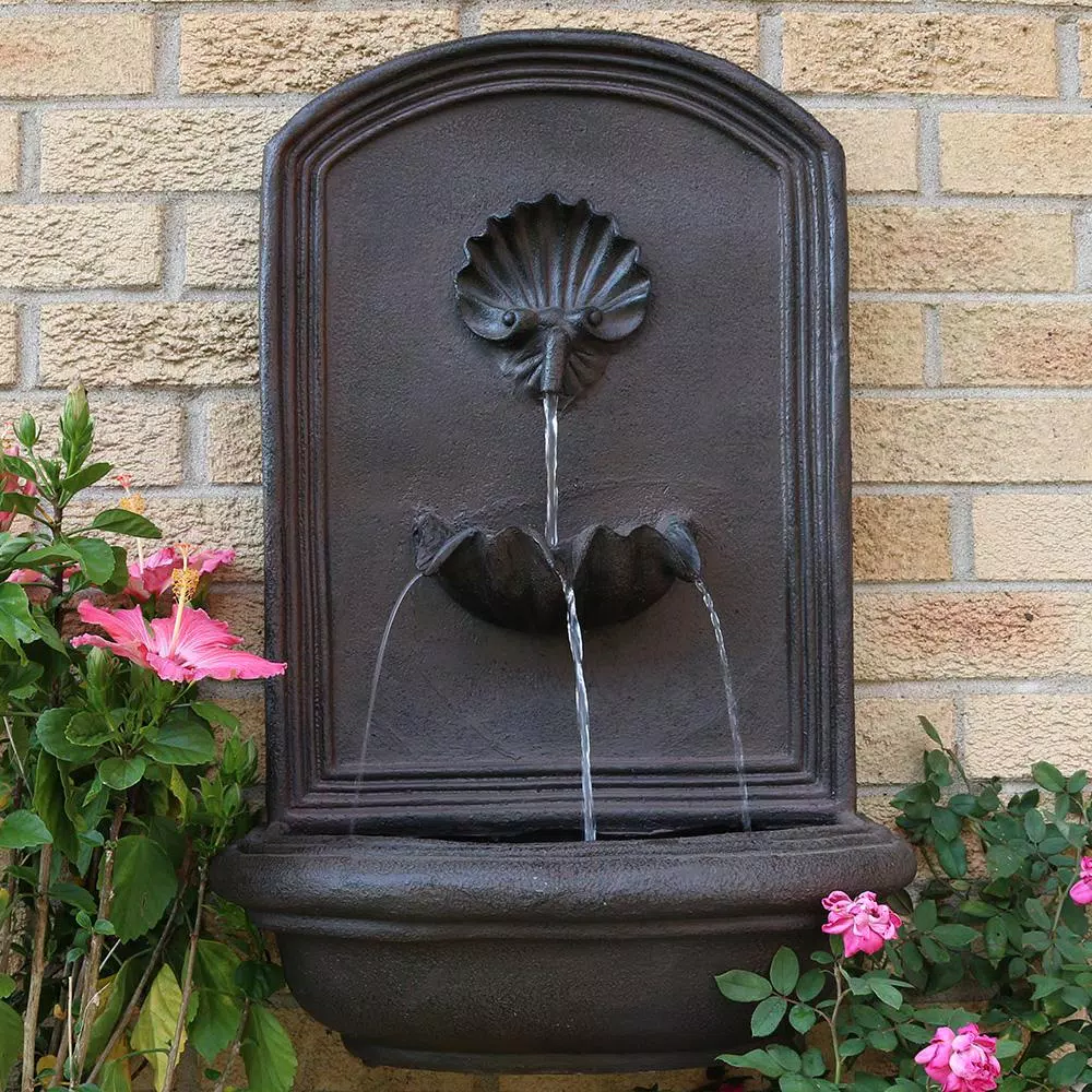 Sunnydaze Decor Seaside Iron Solar Powered Outdoor Wall Water Fountain with Battery Backup