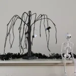 Northlight 24 in. Pre-Lit Black Glitter Halloween Cascading Willow Tree with Bats and Orange LED Lights thumbnail 2