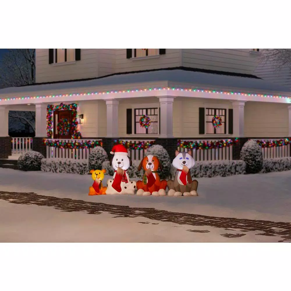 Home Accents Holiday Airblown Inflatables Puppy Pals Christmas Inflatable with Stockings, 7.5 ft. W x 3.74 ft. H
