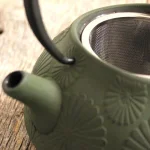 BergHOFF Cast Iron 1.2 Qt. Dark Green Teapot with 18/10 Stainless Steel Mesh Filter thumbnail 3