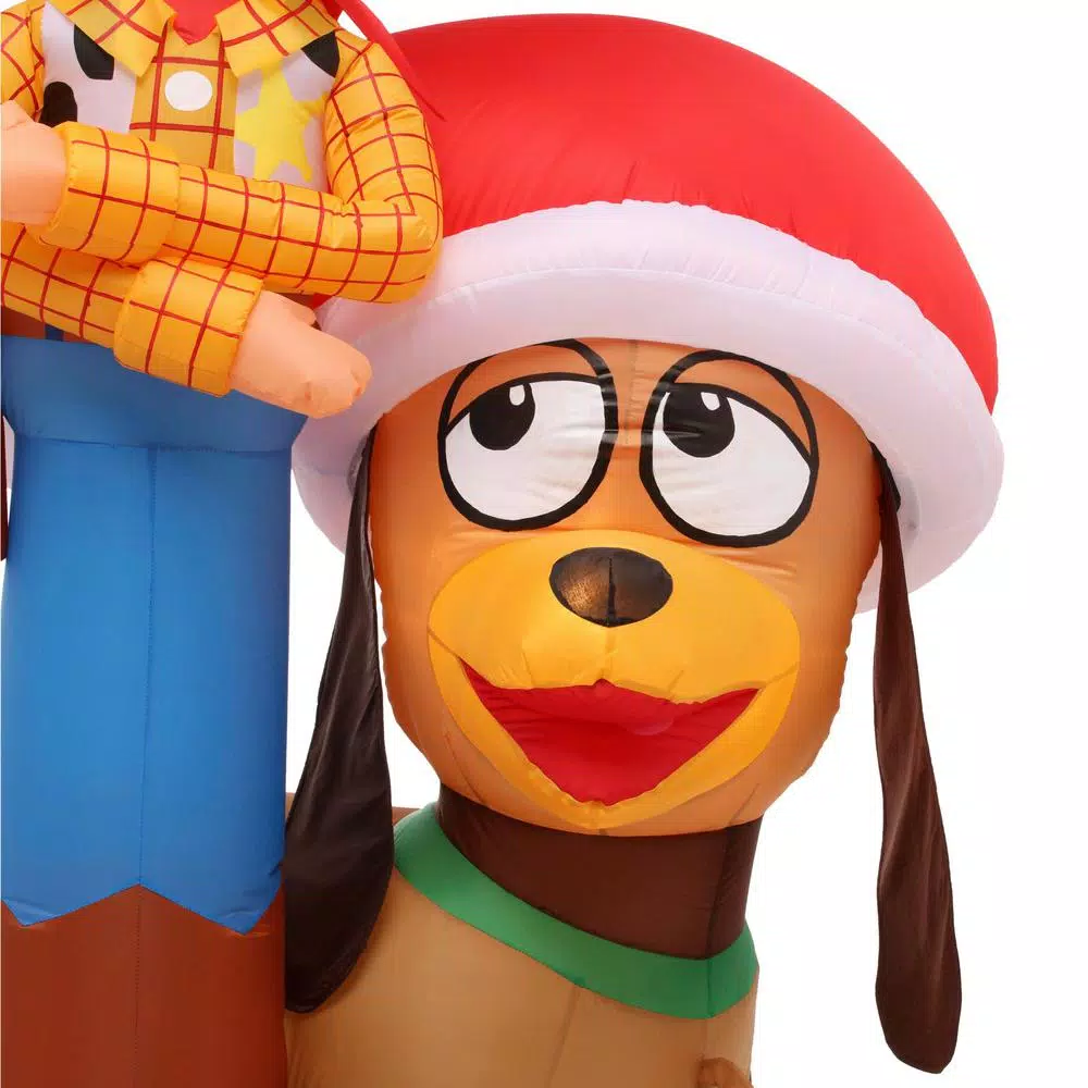 Disney Pixar Toy Story Woody and Slinky 5.6 ft. Pre-lit Inflatable Airblown Holiday Scene