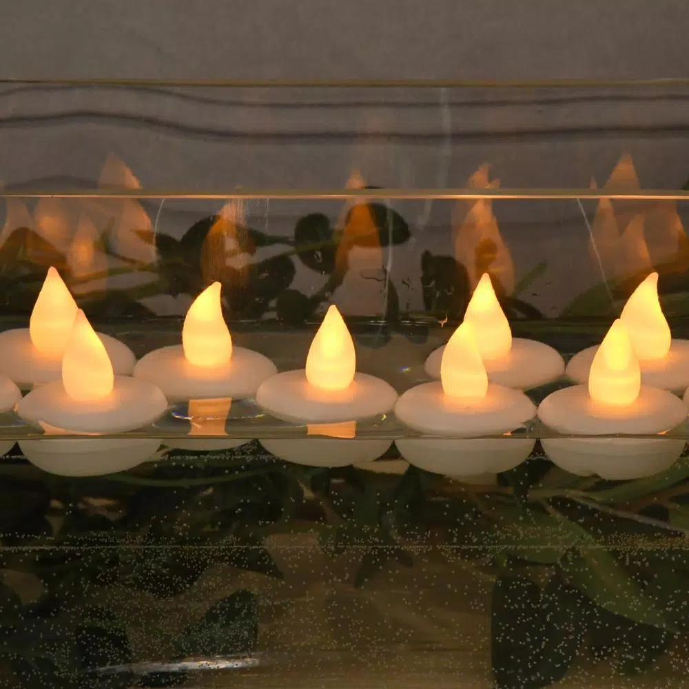 LUMABASE Amber Floating LED Tea Light Candles, Waterproof Battery Operated, 1.25 x 1.25 in, 12-Count