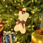 Glitzhome 12.5 in. White Dog Bone Shaped Christmas Stocking with Red Plaid Bow thumbnail 6