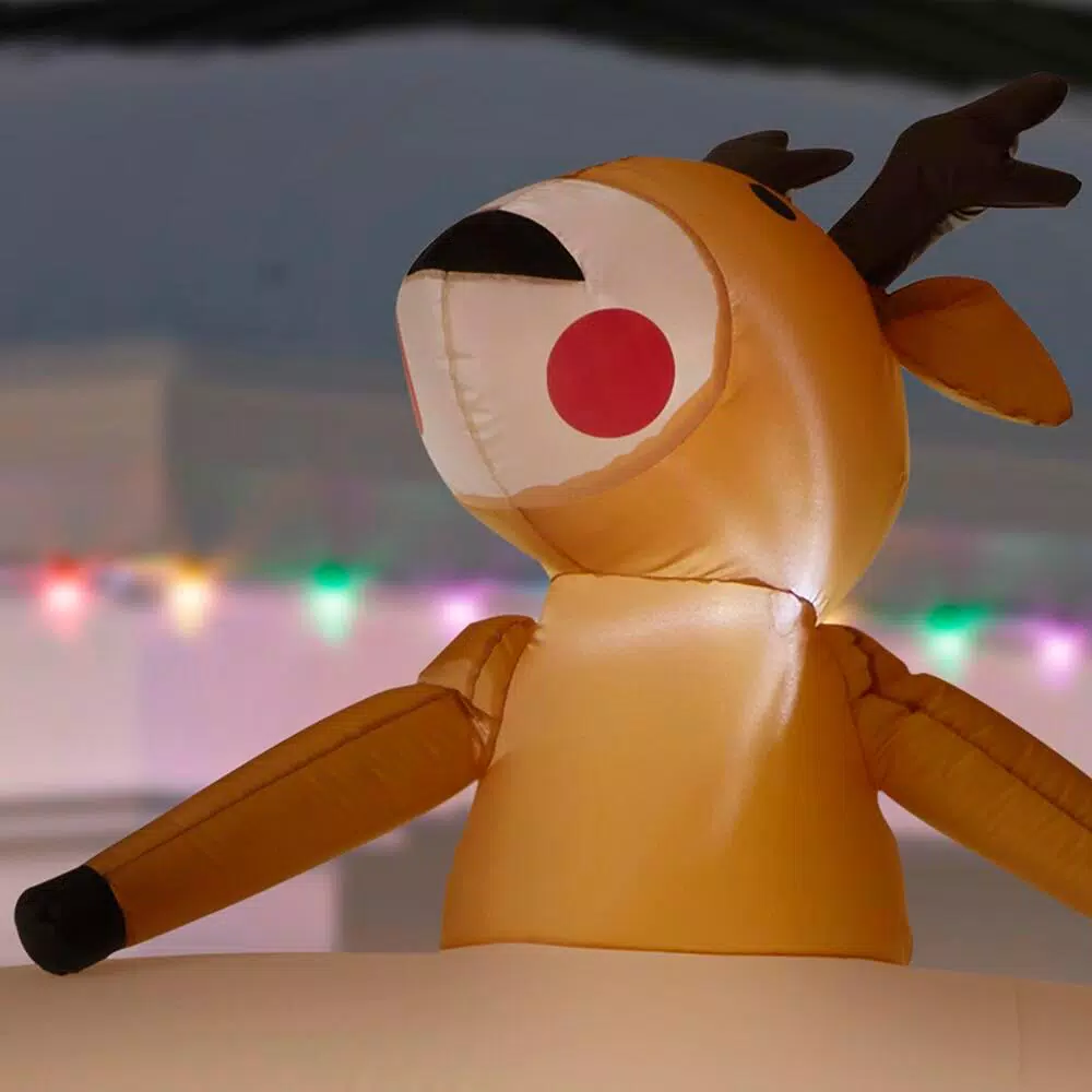 Unbranded 7 ft. Pre-Lit Inflatable Jolly Holiday Camper with Santa, Snowman, and Reindeer