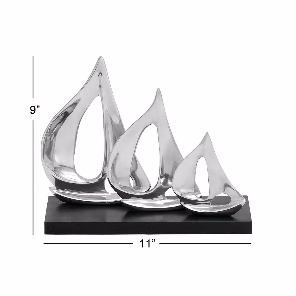 LITTON LANE 9 in. Stylized Sailboat Decorative Sculpture - Polished Silver Aluminum on Black Wood Base