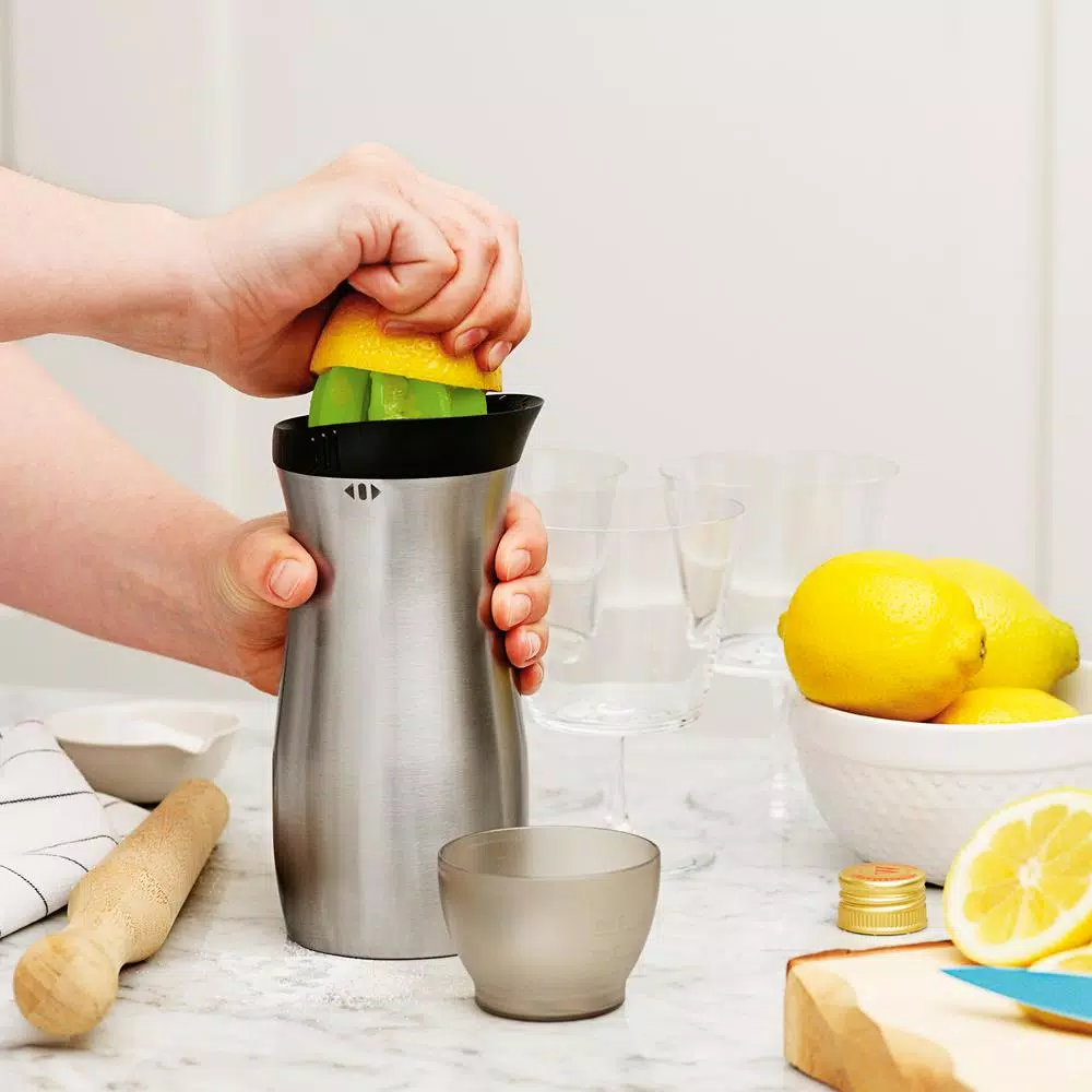 Tovolo Stainless Steel Cocktail Shaker with Built-in Reamer and Jigger Cap, 24 oz