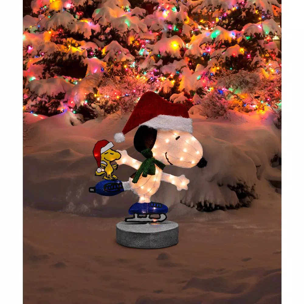 Peanuts 32 in. Pre-Lit Motorized 2D Skating Snoopy and Woodstock Yard Art Christmas Sculpture