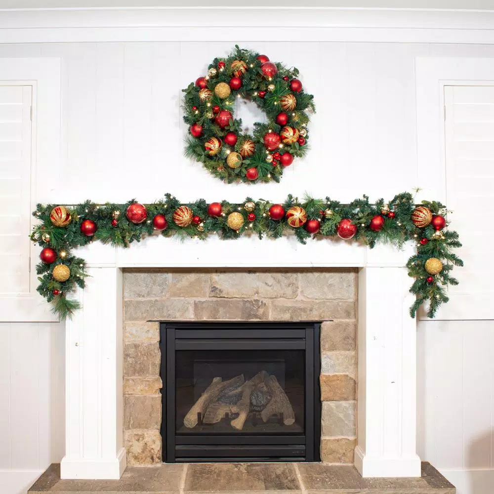 Village Lighting Company 9 ft. Pre-Lit LED Christmas Classic Garland with Red and Gold Ornaments