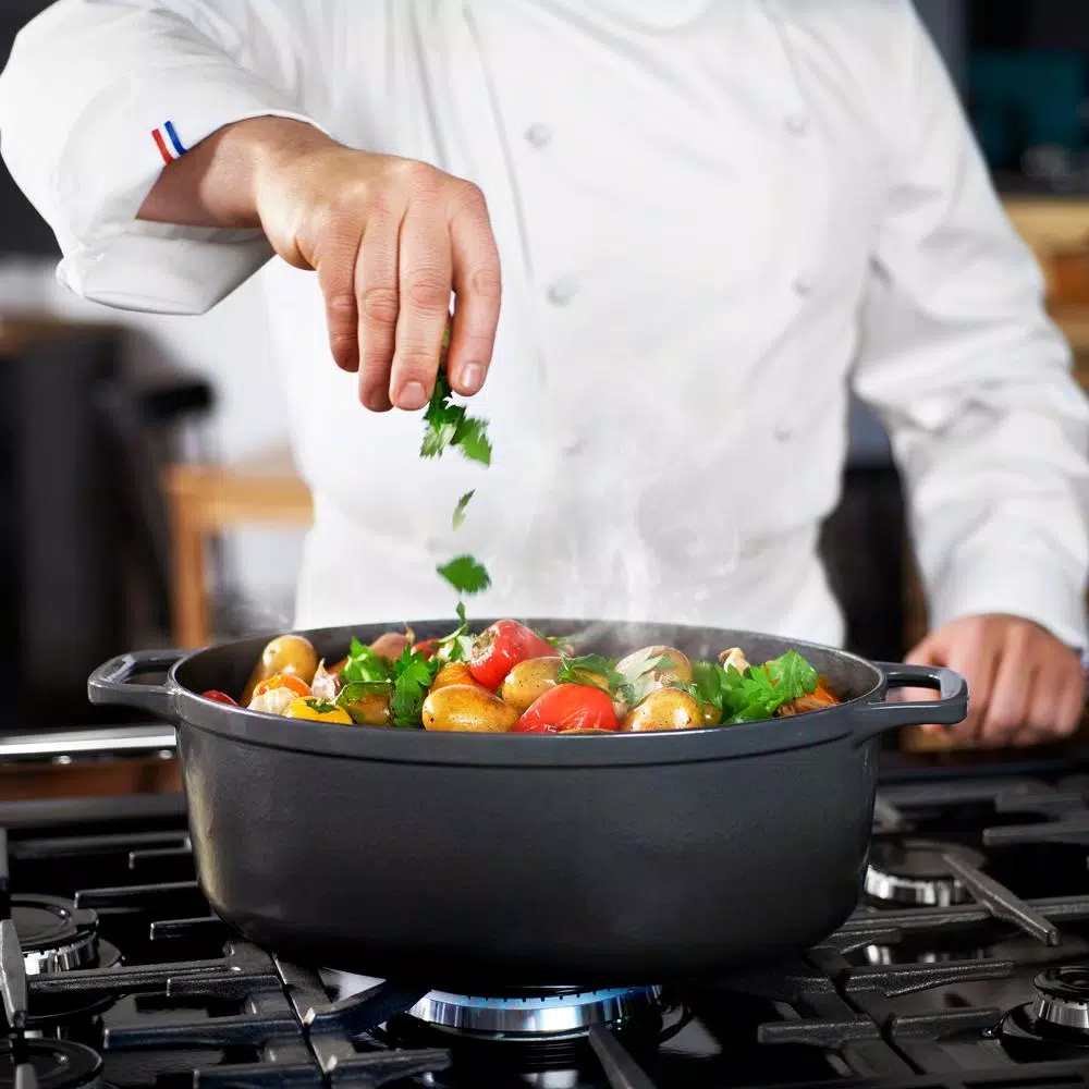 Chasseur 6 qt. Oval Enameled Cast Iron Dutch Oven with Lid, Caviar Grey