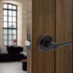 Defiant Highland Aged Bronze Keyed Entry Door Lever with Round Rose thumbnail 2